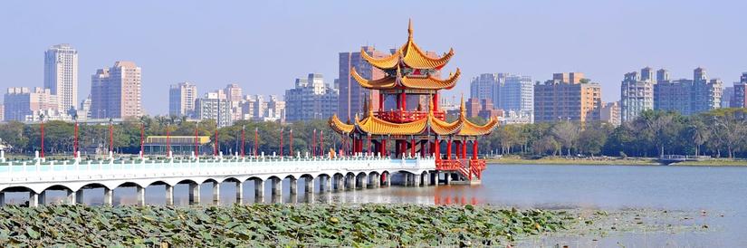 Traditional building in foreground of Kaohsiung cityscape